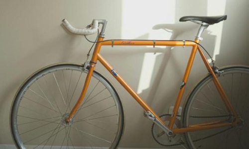 a bicycle parked in a room